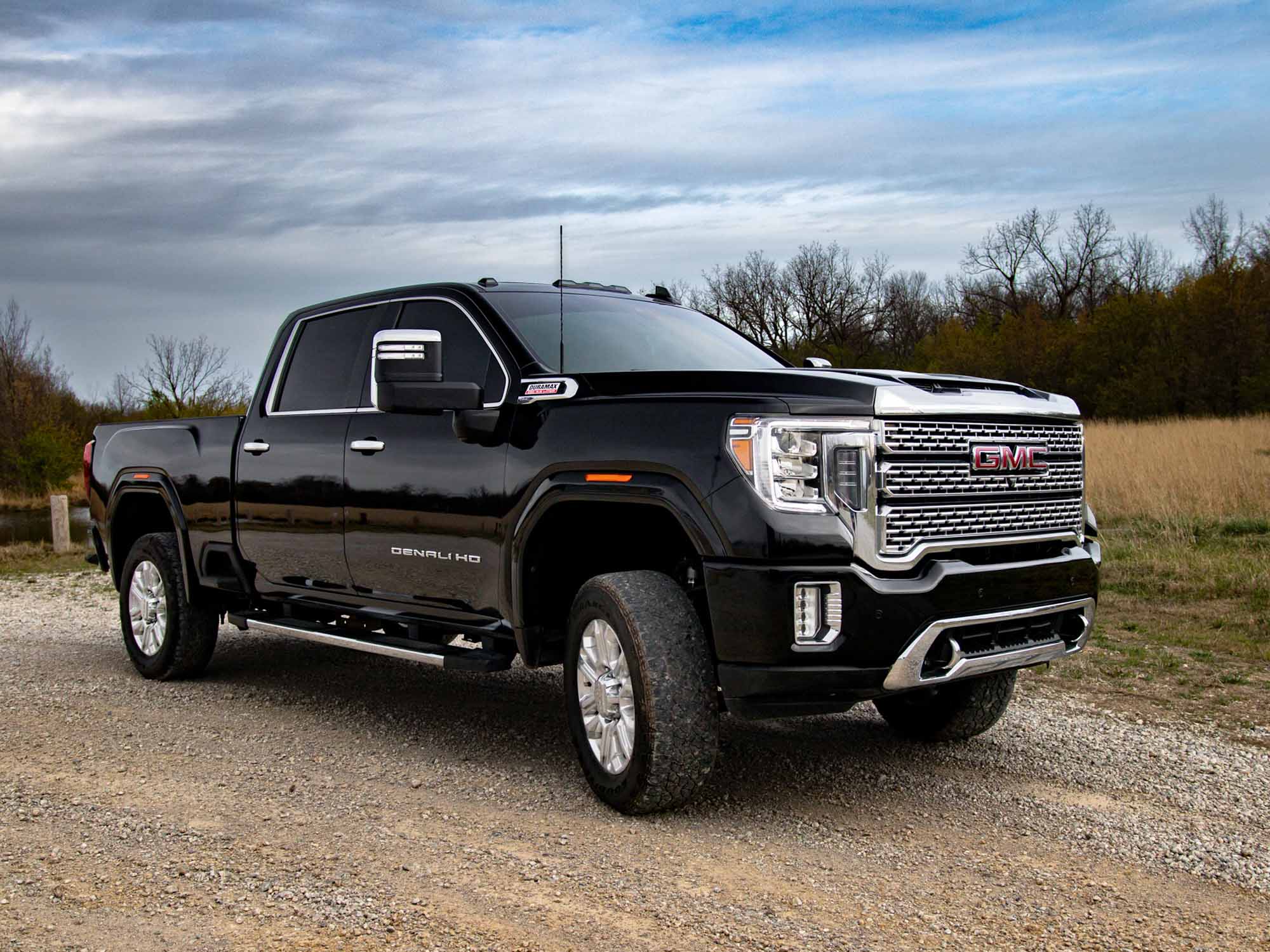 Pre-owned 2022 GMC Sierra 2500 4WD Crew Cab Denali passengers side, deals4wheelz.com